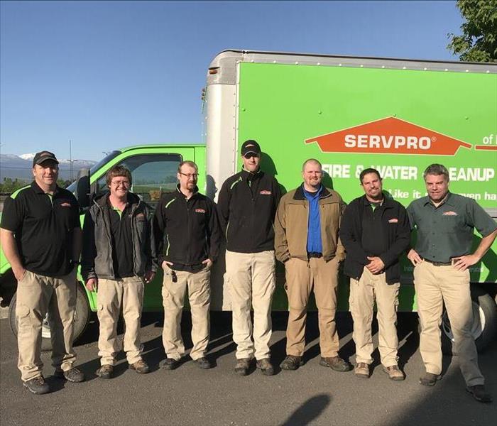 The technicians of SERVPRO of Missoula standing in front of one of the SERVPRO trucks. 